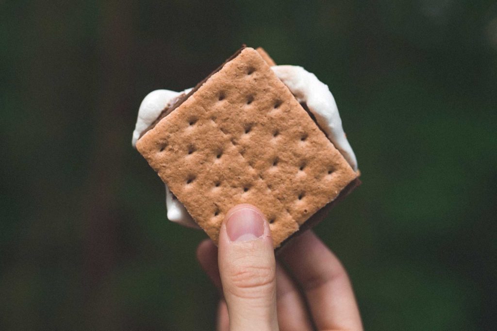 Holding a s'more