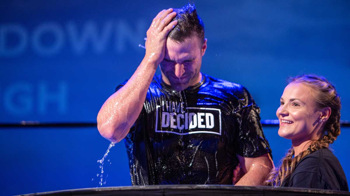 man being baptized